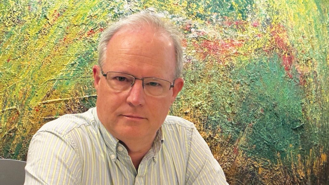 Author Michael Bourne's new novel, We Bring You an Hour of Darkness, is an eco-thriller set in a the newsroom of a daily newspaper.